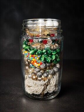 Jar Filled With Assorted Wearable Jewler